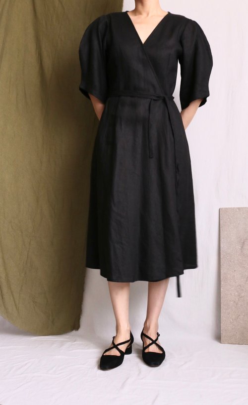 Curved sleeve black linen wrap dress