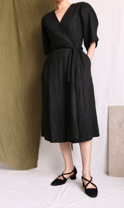 Curved sleeve black linen wrap dress
