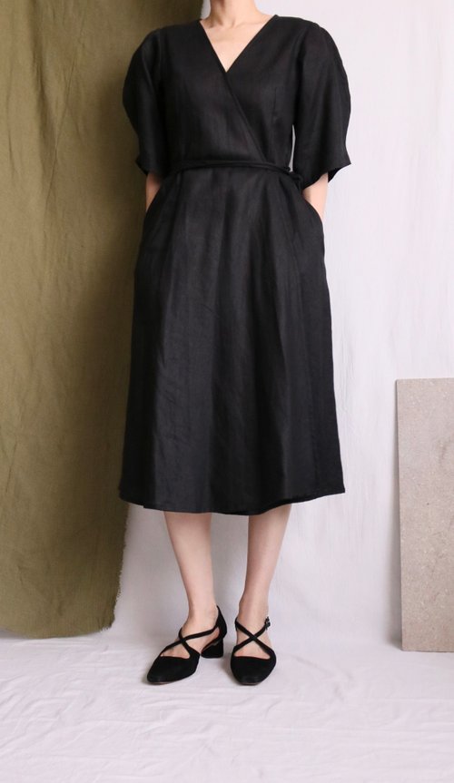 Curved sleeve black linen wrap dress
