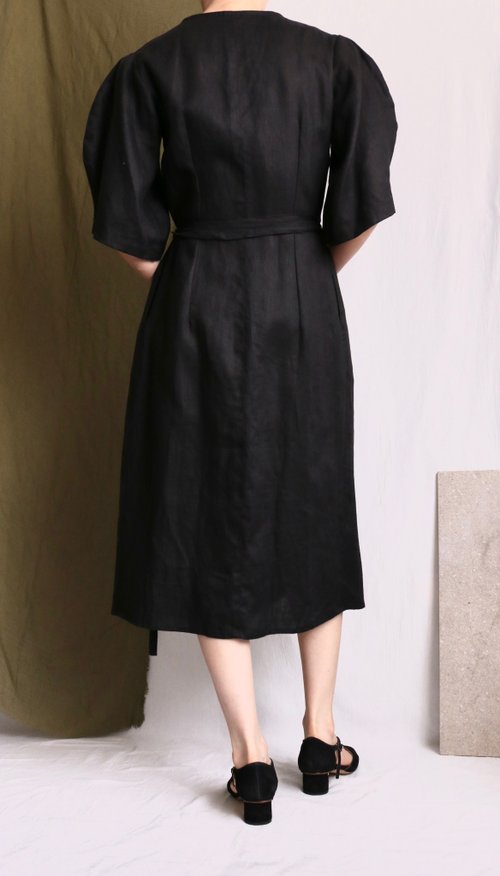 Curved sleeve black linen wrap dress
