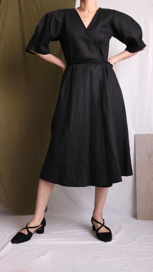 Curved sleeve black linen wrap dress