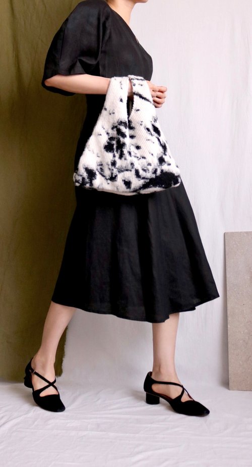 Curved sleeve black linen wrap dress